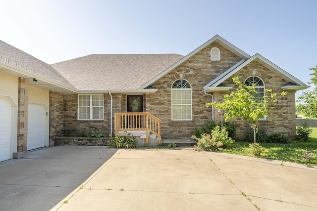 784 S 17th St, Ozark, MO 65721 - ranch-style house with concrete driveway, a shingled roof, brick siding, and an attached garage