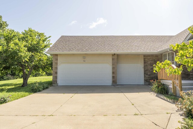 784 S 17th St, Ozark, MO 65721 - garage featuring driveway
