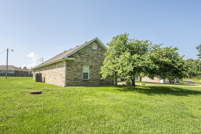 784 S 17th St, Ozark, MO 65721 - view of side of home featuring brick siding and a yard