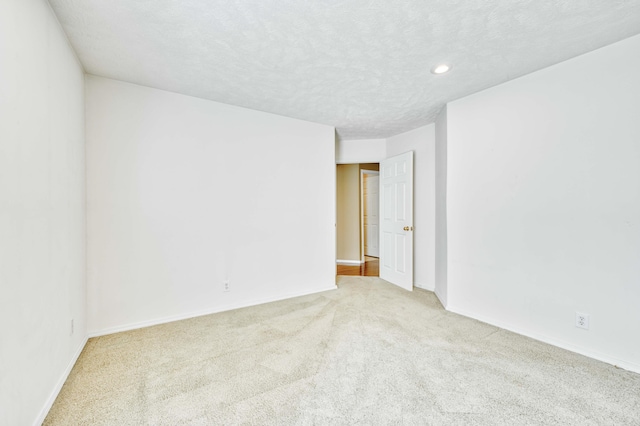 784 S 17th St, Ozark, MO 65721 - carpeted spare room with recessed lighting and a textured ceiling