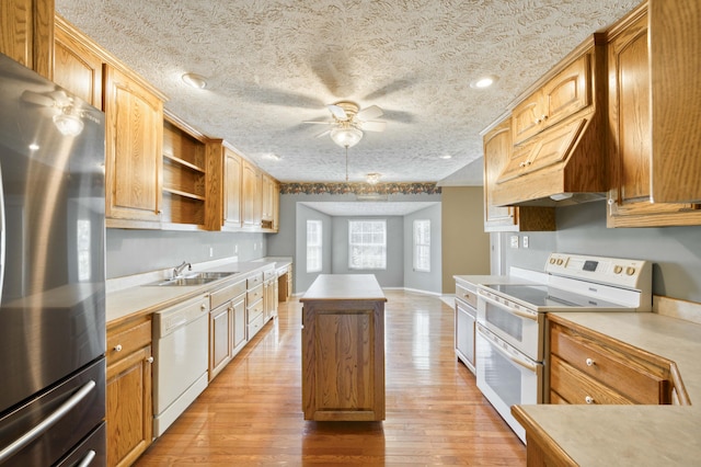 784 S 17th St, Ozark, MO 65721 - kitchen featuring white appliances, light wood finished floors, a ceiling fan, open shelves, and light countertops
