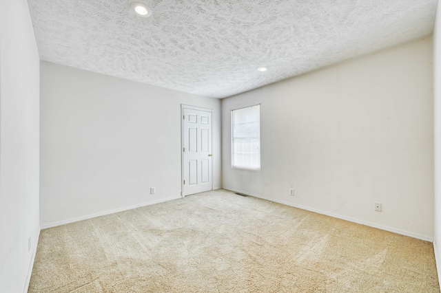 784 S 17th St, Ozark, MO 65721 - carpeted empty room featuring a textured ceiling and recessed lighting
