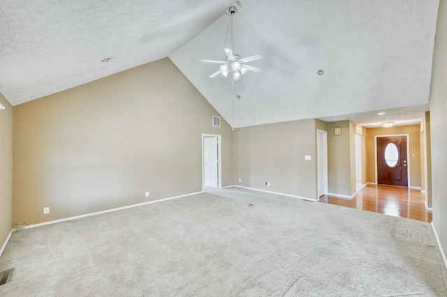 784 S 17th St, Ozark, MO 65721 - unfurnished living room with high vaulted ceiling, carpet flooring, ceiling fan, and a textured ceiling