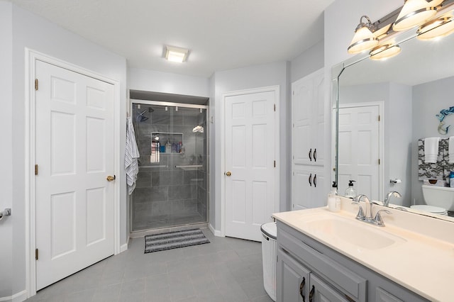 715 W Wasson St, Nixa, MO 65714 - full bathroom featuring a shower stall, vanity, and tile patterned floors