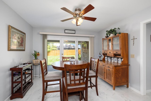 715 W Wasson St, Nixa, MO 65714 - dining room featuring light marble finish flooring and a ceiling fan