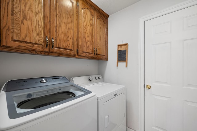 715 W Wasson St, Nixa, MO 65714 - laundry room with washing machine and clothes dryer and cabinet space