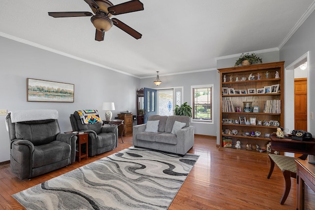 715 W Wasson St, Nixa, MO 65714 - living area with a ceiling fan, wood finished floors, and ornamental molding