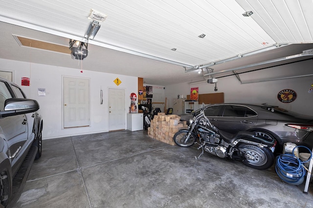 715 W Wasson St, Nixa, MO 65714 - garage with a garage door opener