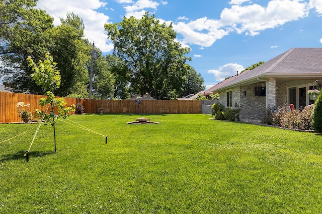 715 W Wasson St, Nixa, MO 65714 - fenced backyard with a fire pit