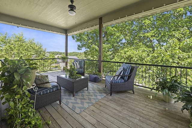 2741 Summit Dr, Joplin, MO 64804 - wooden deck with an outdoor living space and ceiling fan