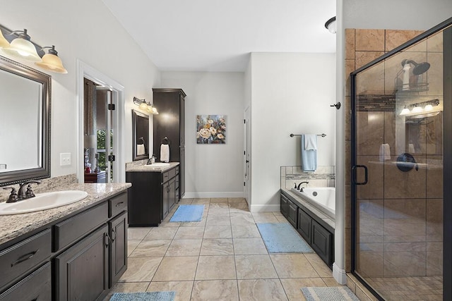 2741 Summit Dr, Joplin, MO 64804 - bathroom with two vanities, a garden tub, and a shower stall