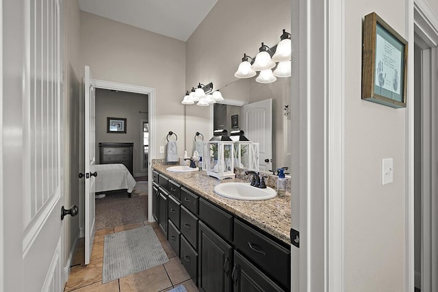 2741 Summit Dr, Joplin, MO 64804 - bathroom featuring double vanity, ensuite bath, and tile patterned floors