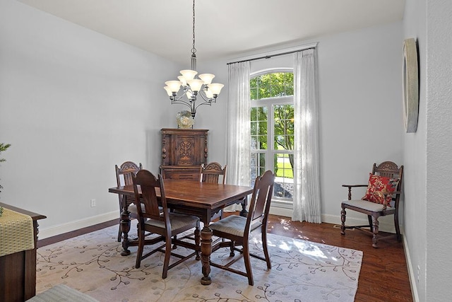 2741 Summit Dr, Joplin, MO 64804 - dining space with a chandelier and light wood-type flooring