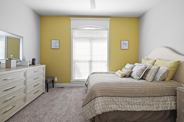 2741 Summit Dr, Joplin, MO 64804 - bedroom featuring carpet, multiple windows, and a ceiling fan