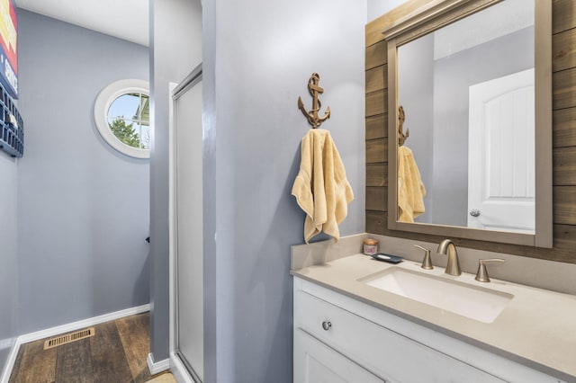 859 Crows Nest Trl, Branson, MO 65616 - bathroom featuring wood finished floors and vanity