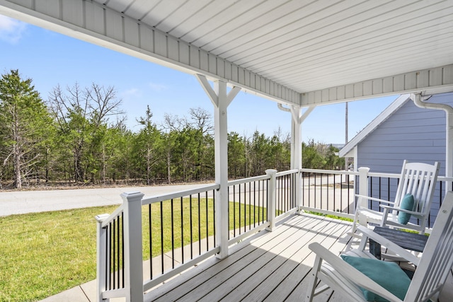 859 Crows Nest Trl, Branson, MO 65616 - wooden porch with a lawn