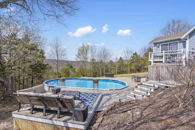 859 Crows Nest Trl, Branson, MO 65616 - outdoor pool featuring a wooden deck, a patio area, and outdoor lounge area