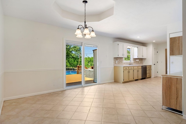 1035 Scenic View Rd, Ozark, MO 65721 - kitchen featuring light countertops, tasteful backsplash, a chandelier, dishwasher, and decorative light fixtures