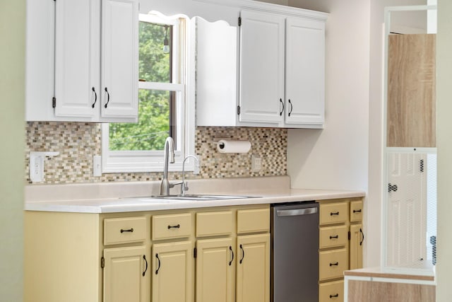 1035 Scenic View Rd, Ozark, MO 65721 - kitchen with dishwasher, light countertops, tasteful backsplash, and white cabinets