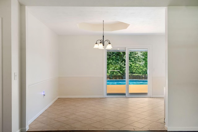 1035 Scenic View Rd, Ozark, MO 65721 - tiled spare room with a chandelier and baseboards