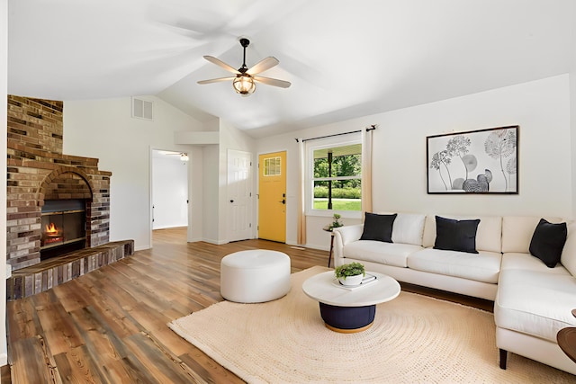 1035 Scenic View Rd, Ozark, MO 65721 - living area with ceiling fan, wood finished floors, vaulted ceiling, and a fireplace