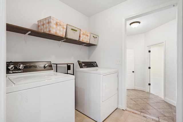 1035 Scenic View Rd, Ozark, MO 65721 - laundry room featuring washing machine and clothes dryer and baseboards