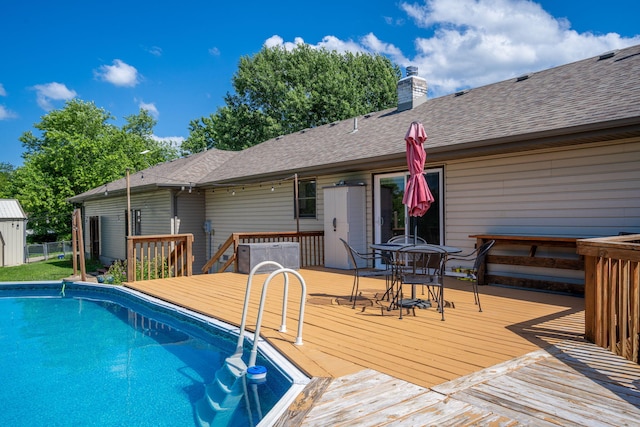 1035 Scenic View Rd, Ozark, MO 65721 - outdoor pool featuring a deck and outdoor dining space