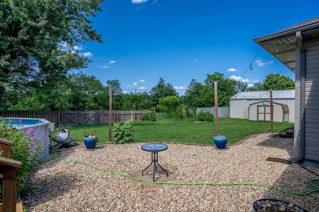 1035 Scenic View Rd, Ozark, MO 65721 - fenced backyard with a storage shed
