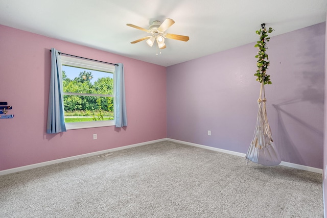 1035 Scenic View Rd, Ozark, MO 65721 - empty room featuring a ceiling fan and carpet flooring