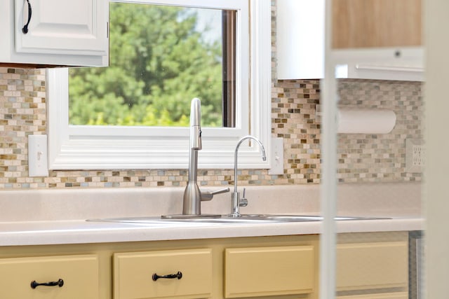 1035 Scenic View Rd, Ozark, MO 65721 - kitchen featuring tasteful backsplash and light countertops