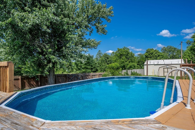 1035 Scenic View Rd, Ozark, MO 65721 - view of pool featuring a fenced backyard and a storage unit