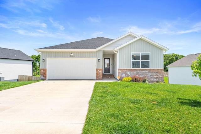 504 N Cheyenne Valley Rd, Nixa, MO 65714 - view of front of property featuring brick siding, board and batten siding, a garage, a front lawn, and driveway