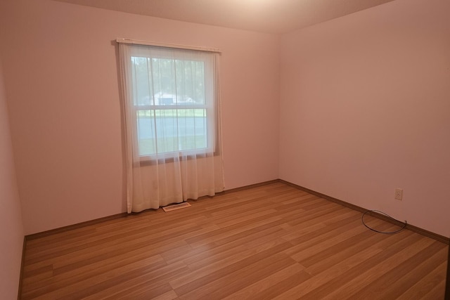 114 S Pinewood Ave, Republic, MO 65738 - empty room with light wood-style flooring and baseboards