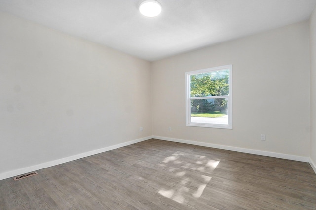 2131 N Pickwick Ave, Springfield, MO 65803 - empty room featuring wood finished floors