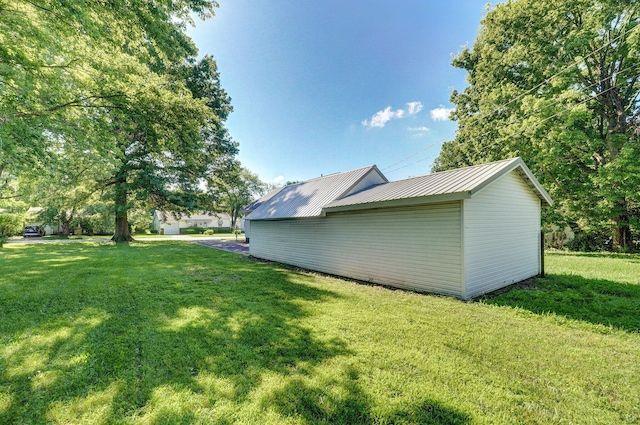 2131 N Pickwick Ave, Springfield, MO 65803 - view of side of property featuring a lawn and a metal roof