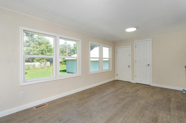 2131 N Pickwick Ave, Springfield, MO 65803 - unfurnished room featuring baseboards and wood finished floors