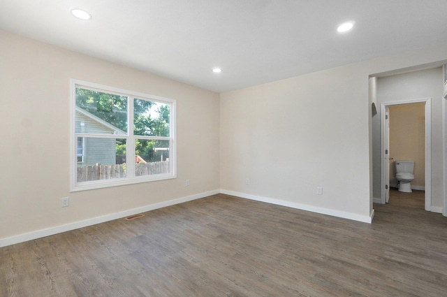 2131 N Pickwick Ave, Springfield, MO 65803 - unfurnished room with wood finished floors and recessed lighting