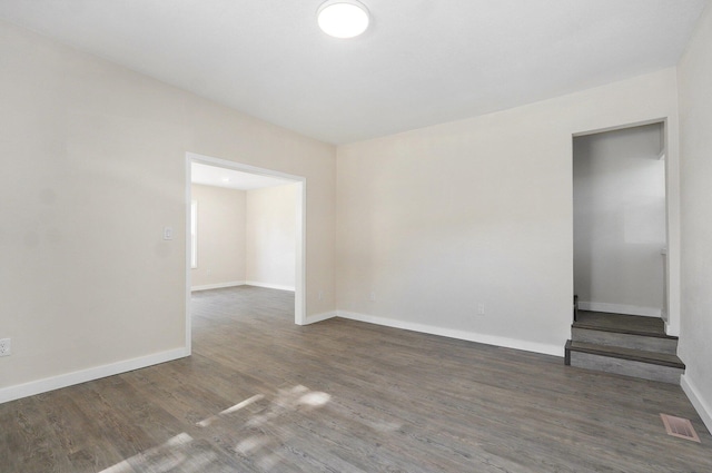 2131 N Pickwick Ave, Springfield, MO 65803 - spare room with wood finished floors and baseboards