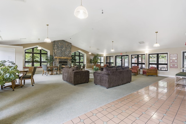 350 Wildwood Dr S Unit 31, Branson, MO 65616 - living area featuring carpet flooring, a stone fireplace, and high vaulted ceiling