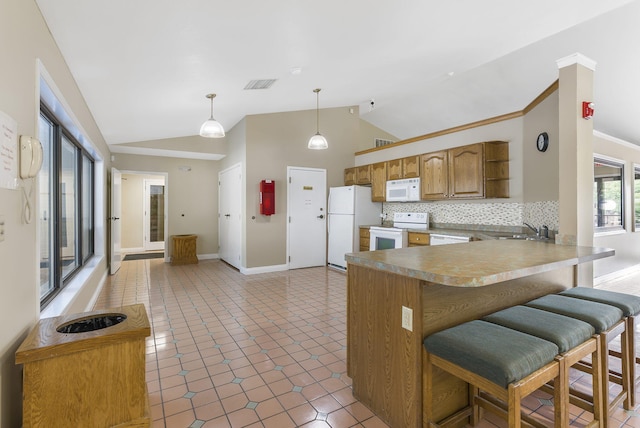 350 Wildwood Dr S Unit 31, Branson, MO 65616 - kitchen with white appliances, open shelves, a kitchen bar, a peninsula, and decorative light fixtures