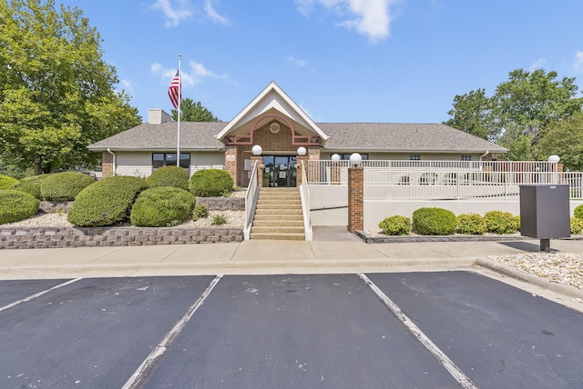 350 Wildwood Dr S Unit 31, Branson, MO 65616 - view of property featuring uncovered parking and stairway