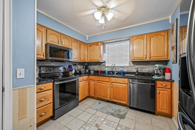 105 W Oak St, Nixa, MO 65714 - kitchen with stainless steel appliances, ceiling fan, decorative backsplash, crown molding, and dark stone counters