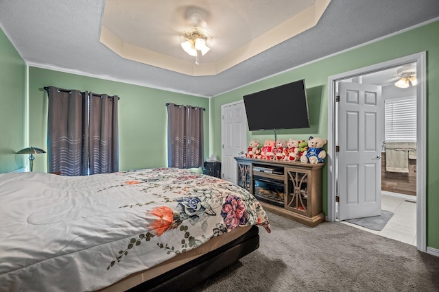 105 W Oak St, Nixa, MO 65714 - bedroom with carpet, a tray ceiling, and ornamental molding