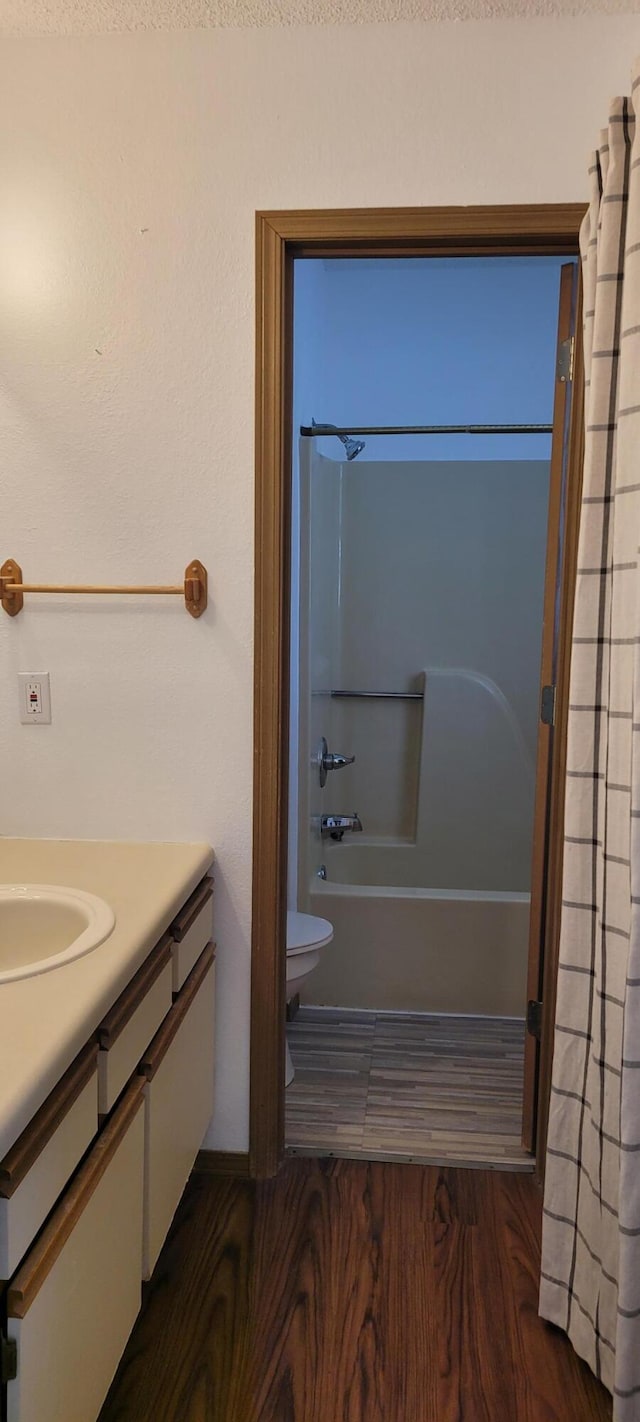 22 Fall Creek Trl Unit 5, Branson, MO 65616 - bathroom with vanity, wood finished floors, and shower / bath combo