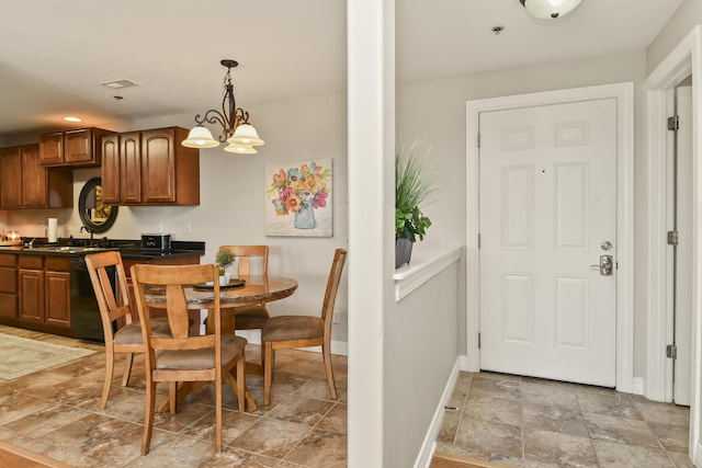 180 Grace Chapel Rd Unit 220, Blue Eye, MO 65611 - dining area featuring stone finish floors, a chandelier, and recessed lighting