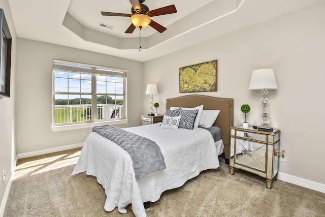 180 Grace Chapel Rd Unit 220, Blue Eye, MO 65611 - carpeted bedroom featuring a raised ceiling and ceiling fan