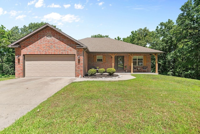1865 Morningside Falls Blvd, Blue Eye, MO 65611 - ranch-style house with a garage, concrete driveway, a front lawn, brick siding, and covered porch