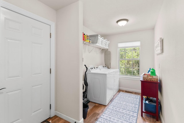 1865 Morningside Falls Blvd, Blue Eye, MO 65611 - laundry area with washer and clothes dryer and light wood finished floors