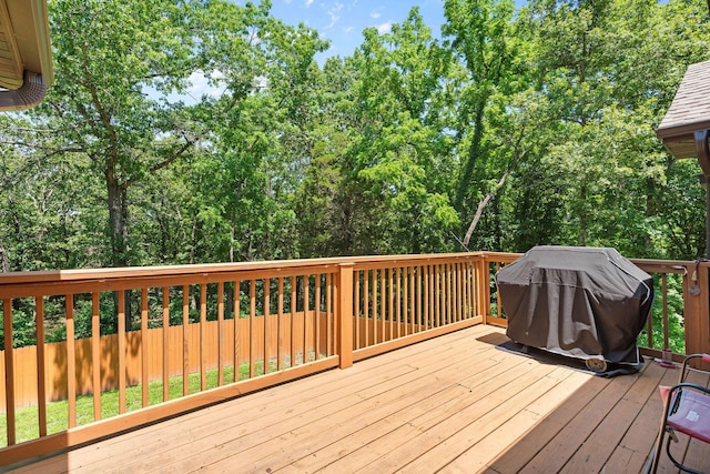 1865 Morningside Falls Blvd, Blue Eye, MO 65611 - deck featuring grilling area and view of wooded area
