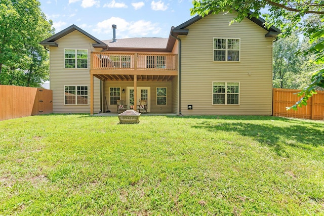 1865 Morningside Falls Blvd, Blue Eye, MO 65611 - rear view of house with a fenced backyard, a deck, and french doors